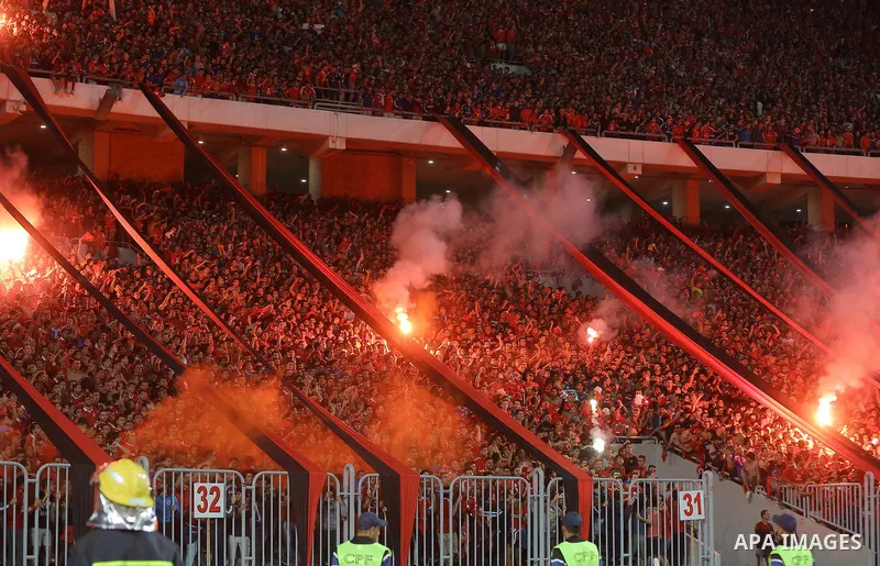 Al-Ahly supporters cheer for their team during the CAF Champions League final football match between Al-Ahly vs Wydad Casablanca at the Borg El Arab Stadium in Alexandria on October 28, 2017. Photo by Stringer