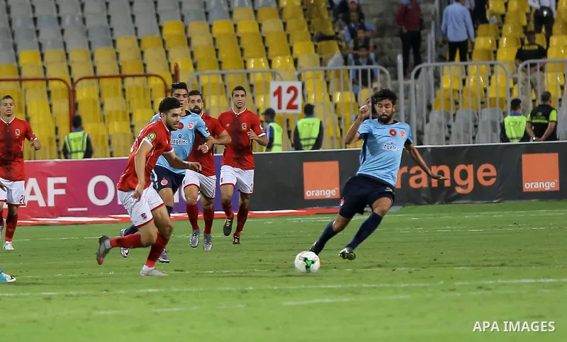 Egypt's Al-Ahly and Wydad Casablanca players compete during the CAF Champions League final football match between Al-Ahly vs Wydad Casablanca at the Borg El Arab Stadium in Alexandria on October 28, 2017. Photo by String...