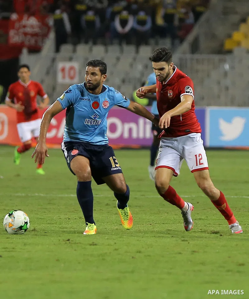 Egypt's Al-Ahly and Wydad Casablanca players compete during the CAF Champions League final football match between Al-Ahly vs Wydad Casablanca at the Borg El Arab Stadium in Alexandria on October 28, 2017. Photo by String...