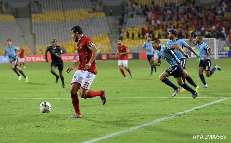 Egypt's Al-Ahly and Wydad Casablanca players compete during the CAF Champions League final football match between Al-Ahly vs Wydad Casablanca at the Borg El Arab Stadium in Alexandria on October 28, 2017. Photo by String...