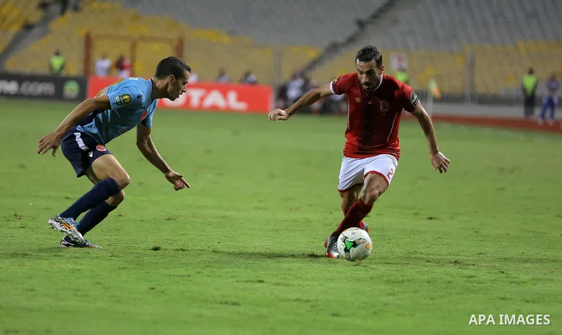 Egypt's Al-Ahly and Wydad Casablanca players compete during the CAF Champions League final football match between Al-Ahly vs Wydad Casablanca at the Borg El Arab Stadium in Alexandria on October 28, 2017. Photo by String...