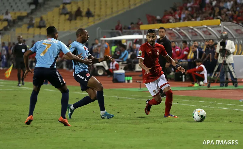 Egypt's Al-Ahly and Wydad Casablanca players compete during the CAF Champions League final football match between Al-Ahly vs Wydad Casablanca at the Borg El Arab Stadium in Alexandria on October 28, 2017. Photo by String...
