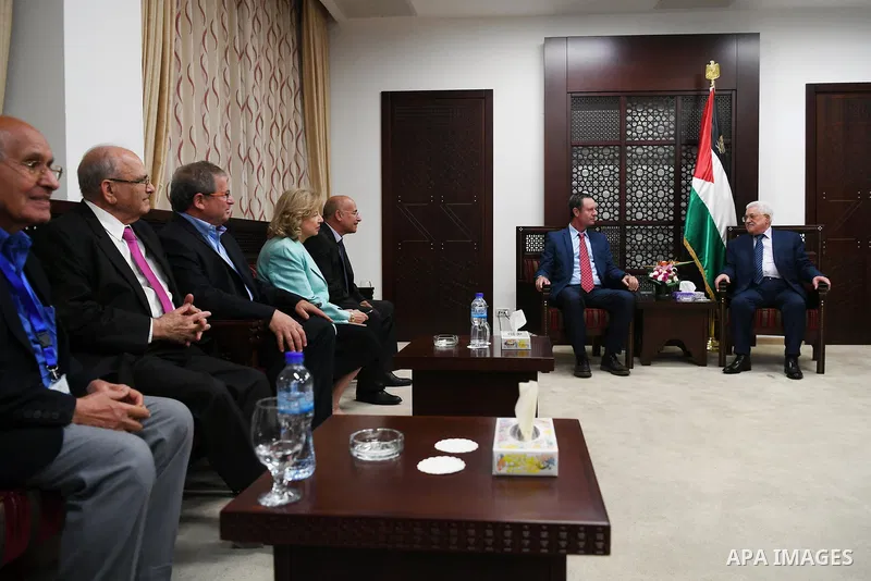 Palestinian President Mahmoud Abbas meets with members of Israeli peace parliament forum at his headquarters in the West Bank city of Ramallah on October 29, 2017. Photo by Thaer Ganaim