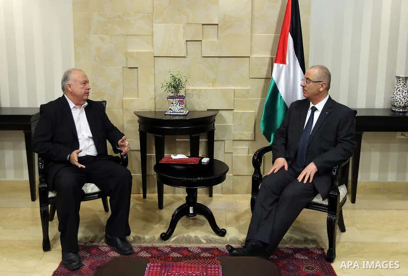 Palestinian Prime Minister, Rami Hamdallah, meets with Coordinator of Jerusalem Hospitals and Director General of Makassed Hospital Rafik Husseini, in the West Bank city of Ramallah on October 30, 2017. Photo by Prime Mi...