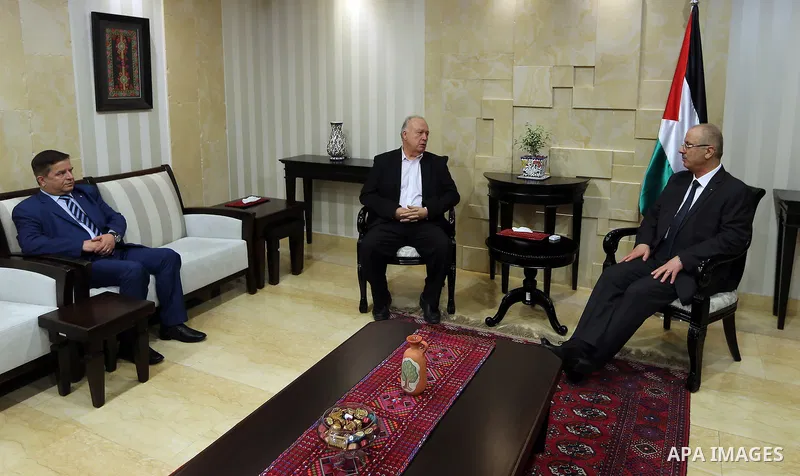 Palestinian Prime Minister, Rami Hamdallah, meets with Coordinator of Jerusalem Hospitals and Director General of Makassed Hospital Rafik Husseini, in the West Bank city of Ramallah on October 30, 2017. Photo by Prime Mi...