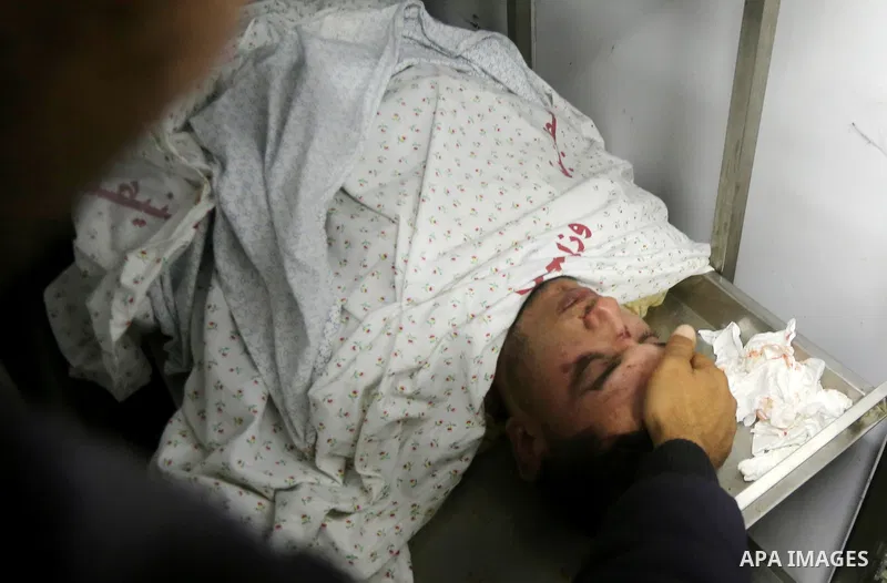 The body of Palestinian Misbah Shabir,30, lies at a morgue after he was killed when Israel blew up what it said was a tunnel stretching from the Gaza Strip into its territory, at Naser hospital in Khan Yunis, in southern...
