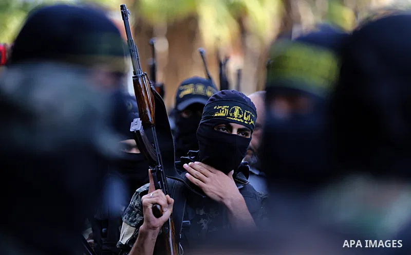 Palestinian Islamic Jihad militants attend the funeral of comrades killed in an Israeli operation to blow up a tunnel stretching from the Gaza Strip into Israel at the Bureij refugee camp, in central Gaza, on October 31,...