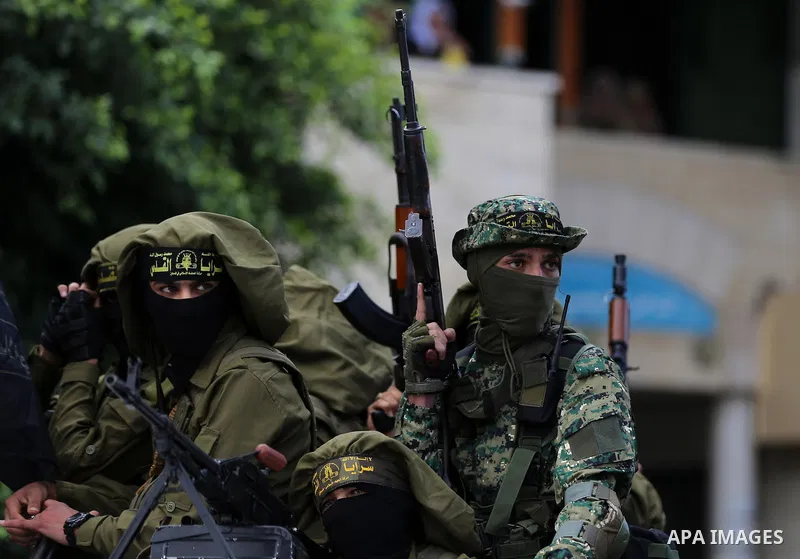 Palestinian Islamic Jihad militants attend the funeral of comrades killed in an Israeli operation to blow up a tunnel stretching from the Gaza Strip into Israel at the Bureij refugee camp, in central Gaza, on October 31,...