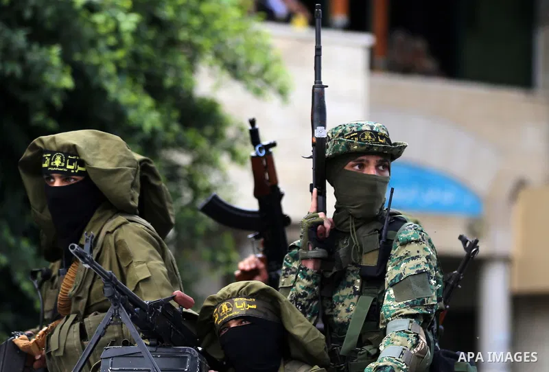 Palestinian Islamic Jihad militants attend the funeral of comrades killed in an Israeli operation to blow up a tunnel stretching from the Gaza Strip into Israel at the Bureij refugee camp, in central Gaza, on October 31,...