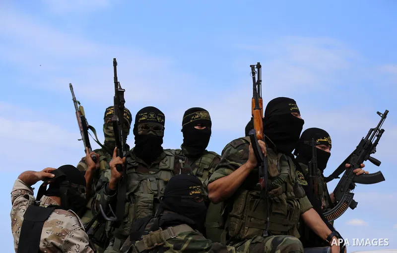Palestinian Islamic Jihad militants attend the funeral of comrades killed in an Israeli operation to blow up a tunnel stretching from the Gaza Strip into Israel at the Bureij refugee camp, in central Gaza, on October 31,...