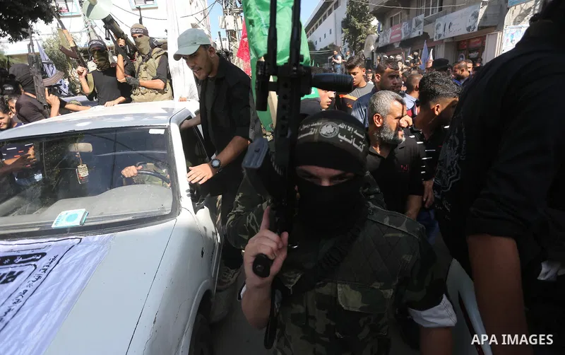 Palestinian Islamic Jihad militants attend the funeral of one of the Palestinians killed in an Israeli operation to blow up a tunnel stretching from the Gaza Strip into Israel in Bureij refugee camp in central Gaza Strip...