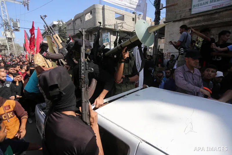 Palestinian Islamic Jihad militants attend the funeral of one of the Palestinians killed in an Israeli operation to blow up a tunnel stretching from the Gaza Strip into Israel in Bureij refugee camp in central Gaza Strip...