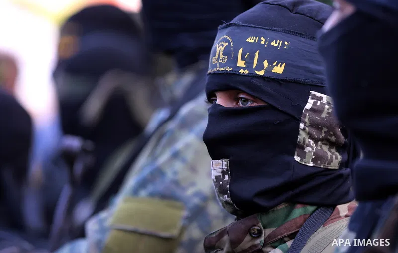 Palestinian Islamic Jihad militants attend the funeral of comrades killed in an Israeli operation to blow up a tunnel stretching from the Gaza Strip into Israel at the Bureij refugee camp, in central Gaza, on October 31,...