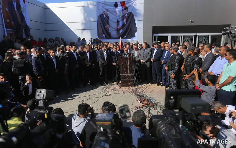 Palestinian housing minister Mufeed al-Hasayna Mufeed al-Husayna speaks during a press conference at Rafah border crossing with Egypt, in the southern Gaza Strip November 1, 2017. Hamas handed over control of the Gaza St...
