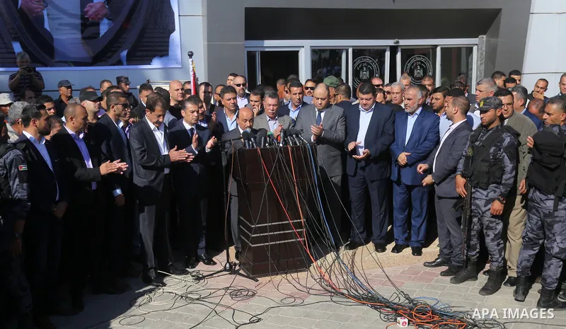 Palestinian housing minister Mufeed al-Hasayna Mufeed al-Husayna speaks during a press conference at Rafah border crossing with Egypt, in the southern Gaza Strip November 1, 2017. Hamas handed over control of the Gaza St...
