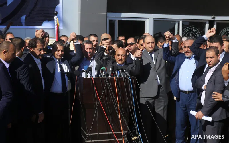 Palestinian housing minister Mufeed al-Hasayna Mufeed al-Husayna speaks during a press conference at Rafah border crossing with Egypt, in the southern Gaza Strip November 1, 2017. Hamas handed over control of the Gaza St...
