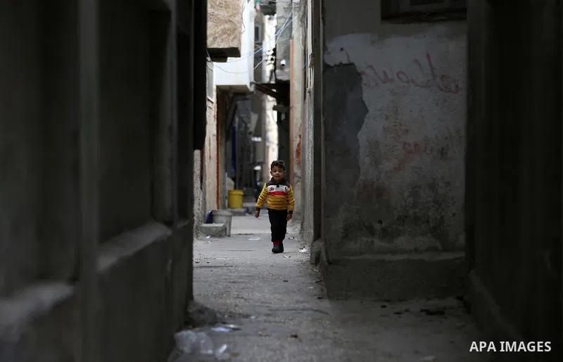 A Palestinian boy walks on a street at Balata refugee camp near in the West Bank city of Nablus, on November 1, 2017. This week, Palestinians around the world are marking 100 years since the Balfour Declaration was issue...