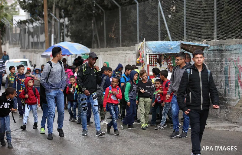 Palestinian students play on a street at the Balata refugee camp near the West Bank city of Nablus, on November 1, 2017. This week, Palestinians around the world are marking 100 years since the Balfour Declaration was is...
