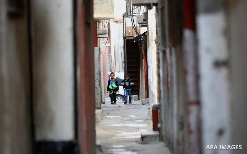 Palestinian boys walk on a street at Balata refugee camp near in the West Bank city of Nablus, on November 1, 2017. This week, Palestinians around the world are marking 100 years since the Balfour Declaration was issued...