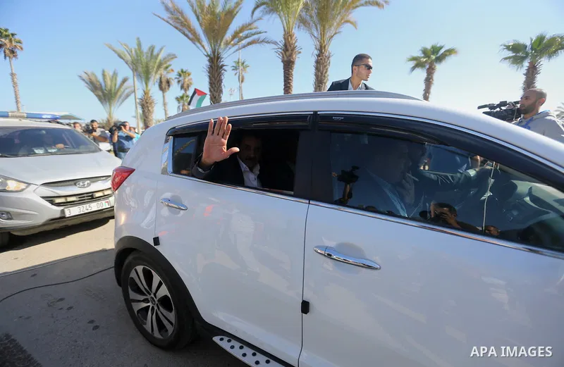 Palestinian housing minister Mufeed al-Hasayna Mufeed al-Husayna, gestures as he arrives at Rafah border crossing with Egypt, in the southern Gaza Strip November 1, 2017. Hamas handed over control of the Gaza Strip's bor...