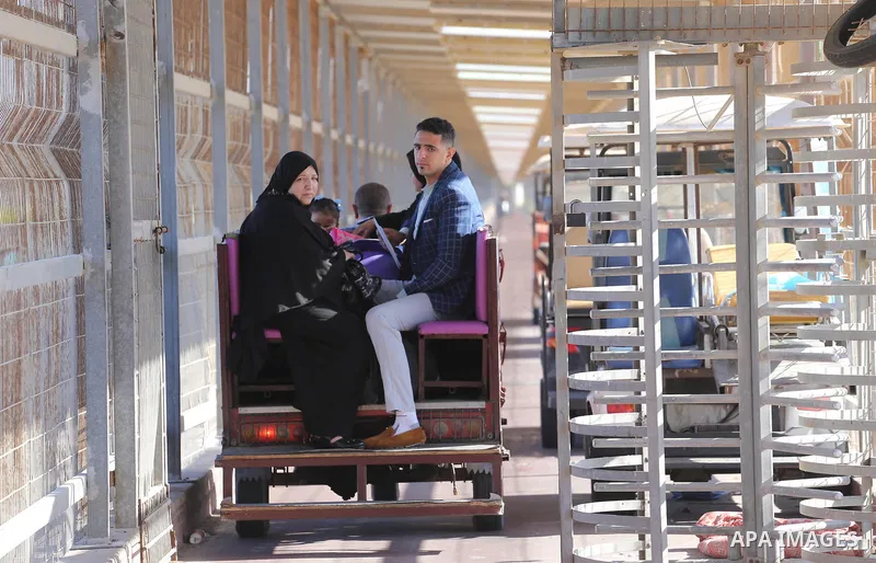 Palestinians ride a Tuk Tuk as they travel to west bank through the Erez crossing, in the northern Gaza Strip November 1, 2017. Hamas handed over control of the Gaza Strip's borders with Egypt and Israel to the Palestini...