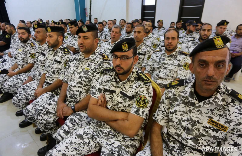 Palestinian naval security forces attend the ceremony of the first anniversary the achievements of the naval police unit, in Gaza City, on November 6, 2017. Photo by Mohammed Asad