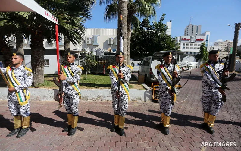 Palestinian naval security forces attend the ceremony of the first anniversary the achievements of the naval police unit, in Gaza City, on November 6, 2017. Photo by Mohammed Asad