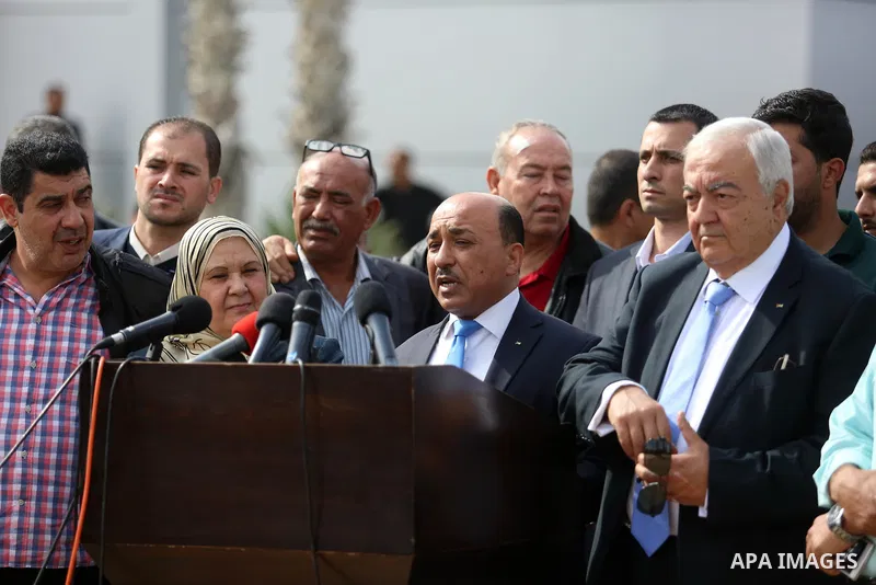 Palestinian housing minister Mufeed al-Hasayna speaks during a press conferenvce at the Rafah border crossing with Egypt in the southern Gaza Strip on November 18, 2017, after it opened for three days for the first time...