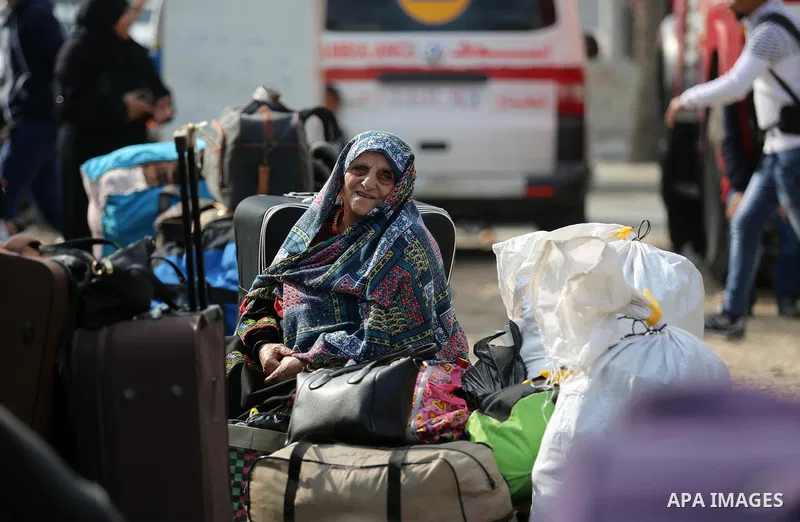 Palestinians wait for travel permits to cross into Egypt under the control of the Palestinian Authority, in Khan Younis in the southern Gaza Strip November 18, 2017, as it opened for three days for the first time since t...