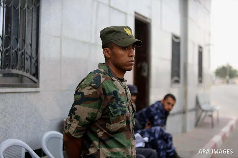 Palestinian security forces stand guard at the Rafah border crossing with Egypt, under the control of the Palestinian Authority, in the southern Gaza Strip on November 18, 2017, as it opened for three days for the first...