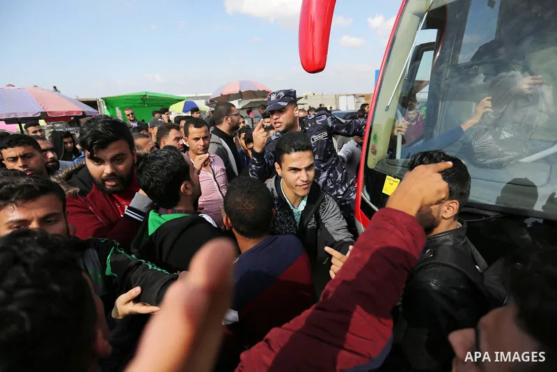 Palestinian students shout outside Rafah border crossing demanding to travel to complete their study abroad in the southern Gaza Strip on November 20, 2017, following its opening for three days for the first time since a...