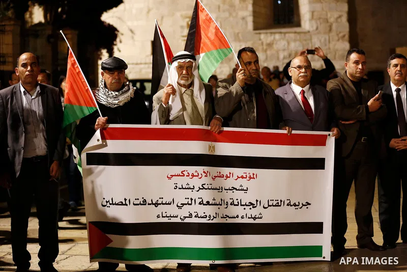 Palestinians take part in a protest in solidarity with Egyptian people after the deadly attack on a mosque in Egypt's Sinai, in the West Bank city of Bethlehem, on Nov. 25, 2017. According to latest reports, a bomb and g...