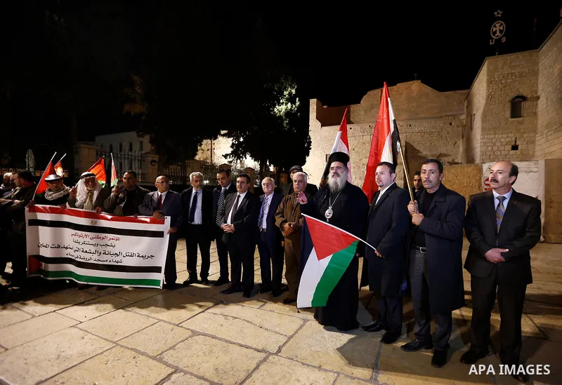 Palestinians take part in a protest in solidarity with Egyptian people after the deadly attack on a mosque in Egypt's Sinai, in the West Bank city of Bethlehem, on Nov. 25, 2017. According to latest reports, a bomb and g...