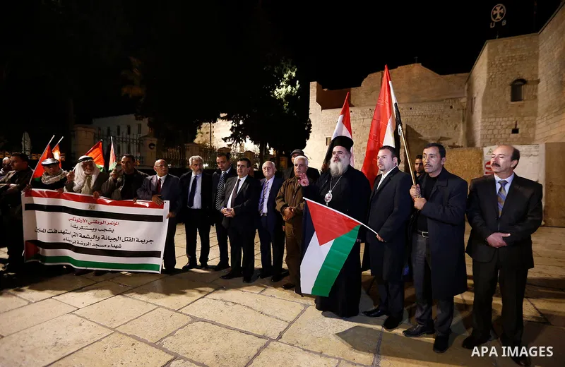 Palestinians take part in a protest in solidarity with Egyptian people after the deadly attack on a mosque in Egypt's Sinai, in the West Bank city of Bethlehem, on Nov. 25, 2017. According to latest reports, a bomb and g...