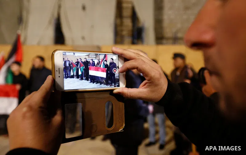 Palestinians take part in a protest in solidarity with Egyptian people after the deadly attack on a mosque in Egypt's Sinai, in the West Bank city of Bethlehem, on Nov. 25, 2017. According to latest reports, a bomb and g...