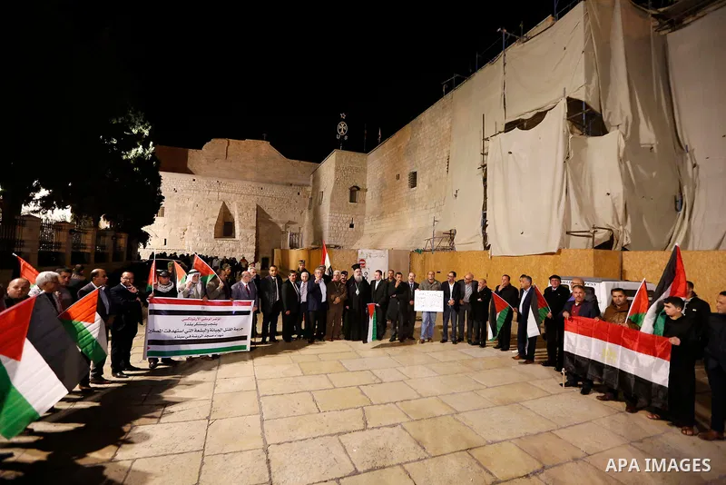 Palestinians take part in a protest in solidarity with Egyptian people after the deadly attack on a mosque in Egypt's Sinai, in the West Bank city of Bethlehem, on Nov. 25, 2017. According to latest reports, a bomb and g...