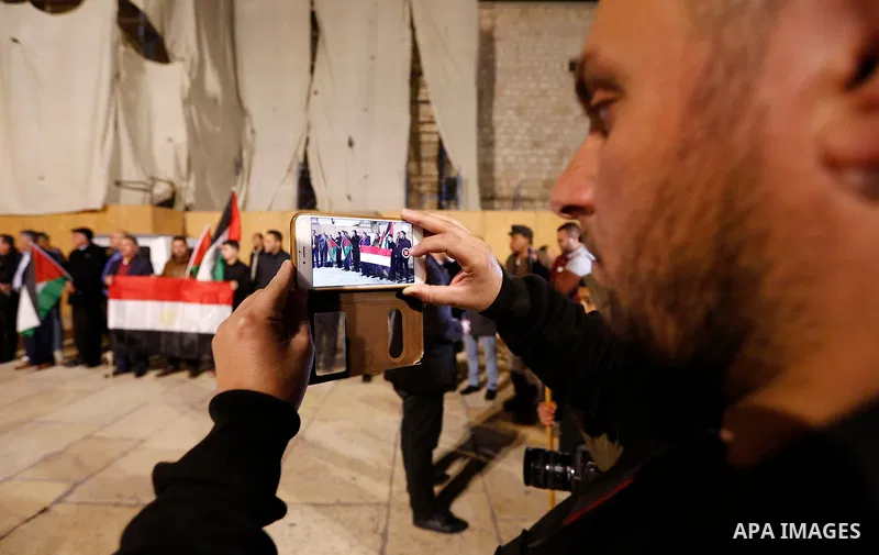 Palestinians take part in a protest in solidarity with Egyptian people after the deadly attack on a mosque in Egypt's Sinai, in the West Bank city of Bethlehem, on Nov. 25, 2017. According to latest reports, a bomb and g...