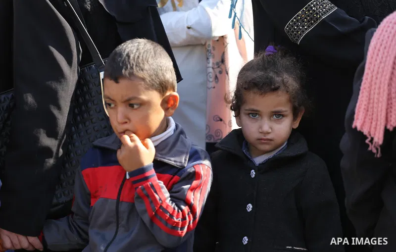 Palestinian orphans take part in a protest against the closure of the accounts of charities in Gaza city, on November 26, 2017. Photo by Mohammed Asad