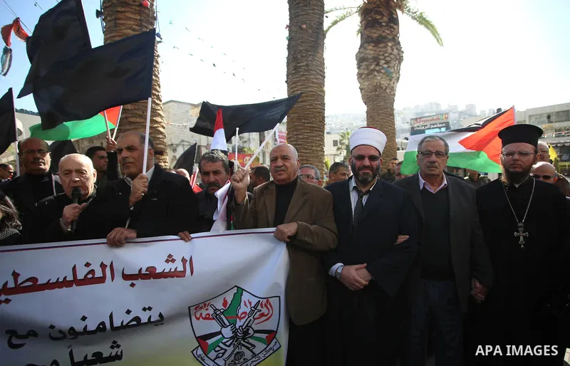 Palestinians take part in a protest in solidarity with Egyptian people after the deadly attack on a mosque in Egypt's Sinai, in the West Bank city of Nablus, on Nov. 26, 2017. According to latest reports, a bomb and gunf...