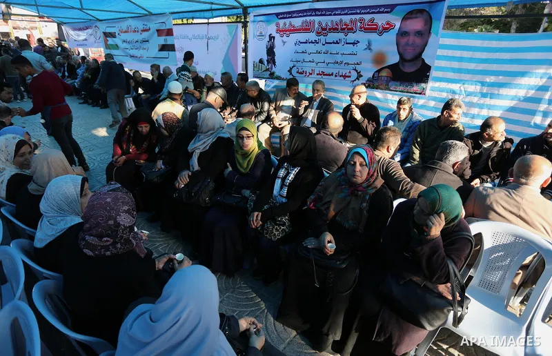 Palestinians take part in a mourning tent set up for people to pay their respects to the Egyptian victims after the deadly attack on a mosque in Egypt's Sinai, on November 26, 2017 in Gaza city. According to latest repor...