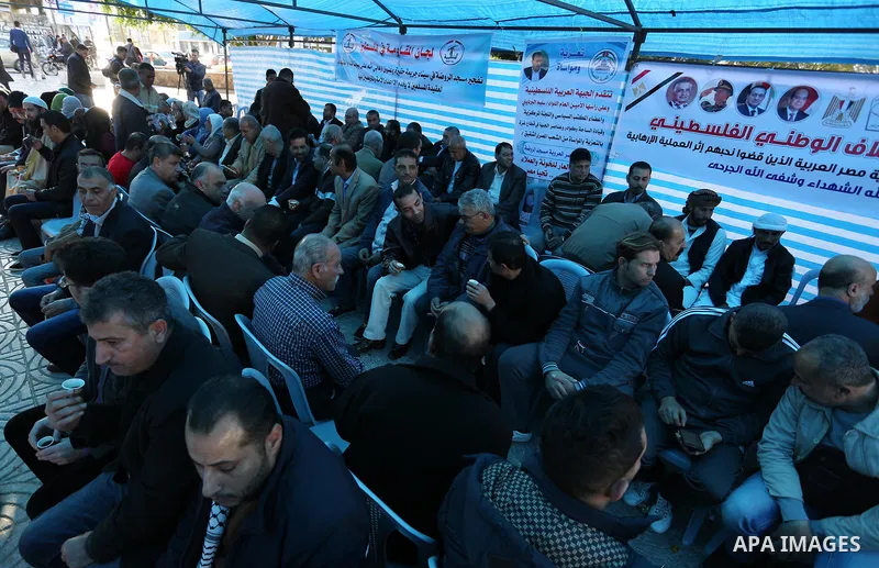 Palestinians take part in a mourning tent set up for people to pay their respects to the Egyptian victims after the deadly attack on a mosque in Egypt's Sinai, on November 26, 2017 in Gaza city. According to latest repor...