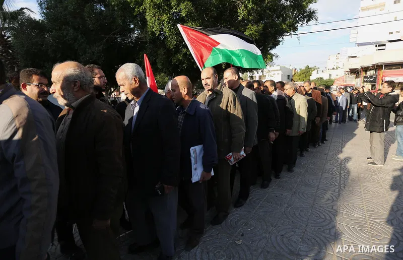 Palestinians take part in a mourning tent set up for people to pay their respects to the Egyptian victims after the deadly attack on a mosque in Egypt's Sinai, on November 26, 2017 in Gaza city. According to latest repor...