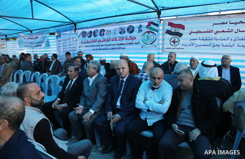 Palestinians take part in a mourning tent set up for people to pay their respects to the Egyptian victims after the deadly attack on a mosque in Egypt's Sinai, on November 26, 2017 in Gaza city. According to latest repor...