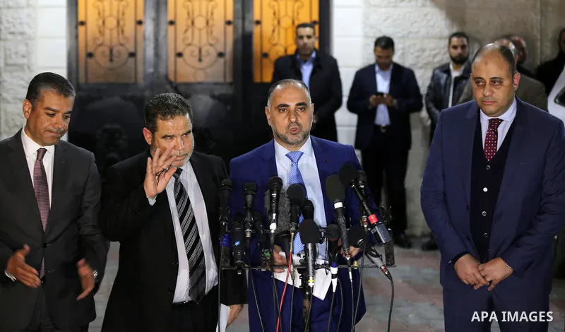 Fatah spokesperson and vice chairman of the Fatah Revolutionary Council, Fayez Abu Eita, speaks during a press conference alongside with Senior Hamas official Salah al-Bardawil, in Gaza city on November 29, 2017. Photo b...