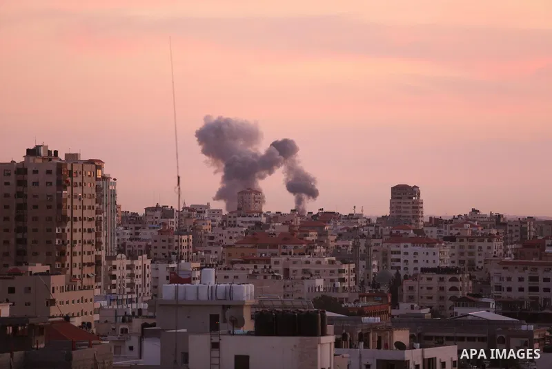 Smoke rises after war crafts belonging to Israeli army carried out airstrikes over Gaza City, Gaza on November 30, 2017. Photo by Ashraf Amra