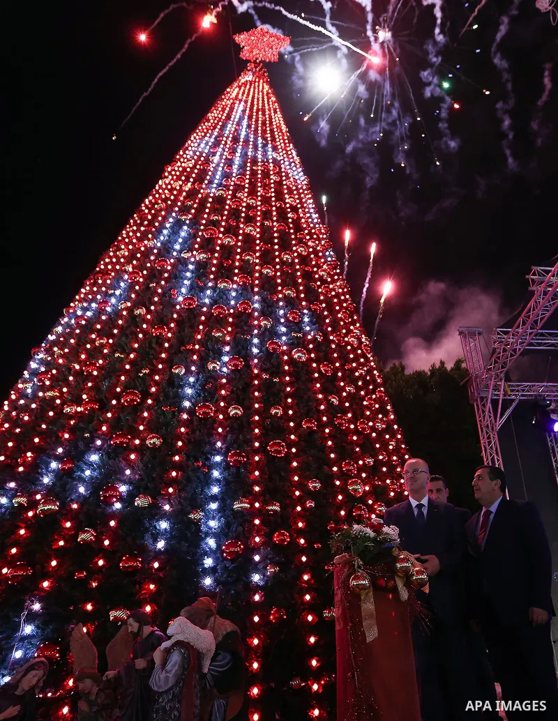 Palestinian Prime minister, Rami Hamdallah attends a Christmas tree lighting ceremony outside the Church of the Nativity in the West Bank town of Bethlehem, December 2, 2017. Photo by Prime Minister Office