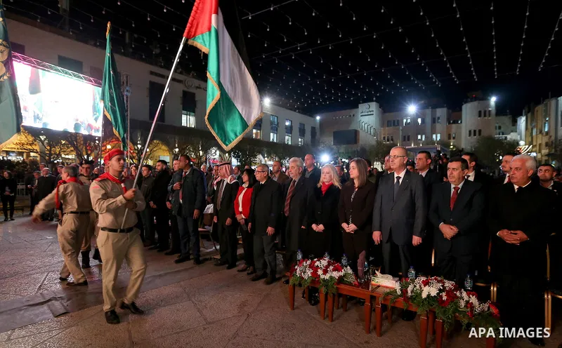 Palestinian Prime minister, Rami Hamdallah attends a Christmas tree lighting ceremony outside the Church of the Nativity in the West Bank town of Bethlehem, December 2, 2017. Photo by Prime Minister Office