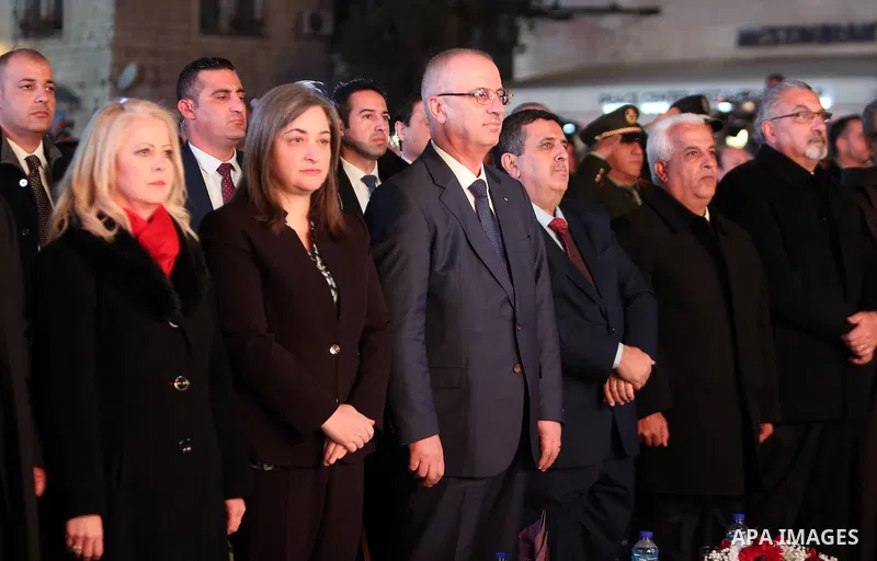 Palestinian Prime minister, Rami Hamdallah attends a Christmas tree lighting ceremony outside the Church of the Nativity in the West Bank town of Bethlehem, December 2, 2017. Photo by Prime Minister Office