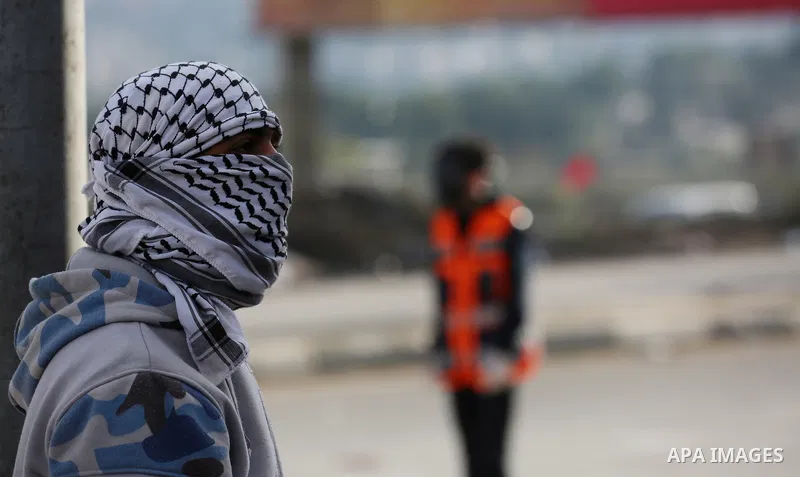 Palestinians throws stones at Israeli troops during clashes in Hawara checkpoint, south of the West Bank city of Nablus, following a demonstration against US President Donald Trump's decision to recognise Jerusalem as th...