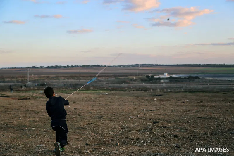 Palestinian protesters clash with Israeli soldiers on the Israeli border with Gaza, Thursday, Dec. 7, 2017. A number of U.S. allies in the Middle East are condemning the Trump administration decision to recognize Jerusal...